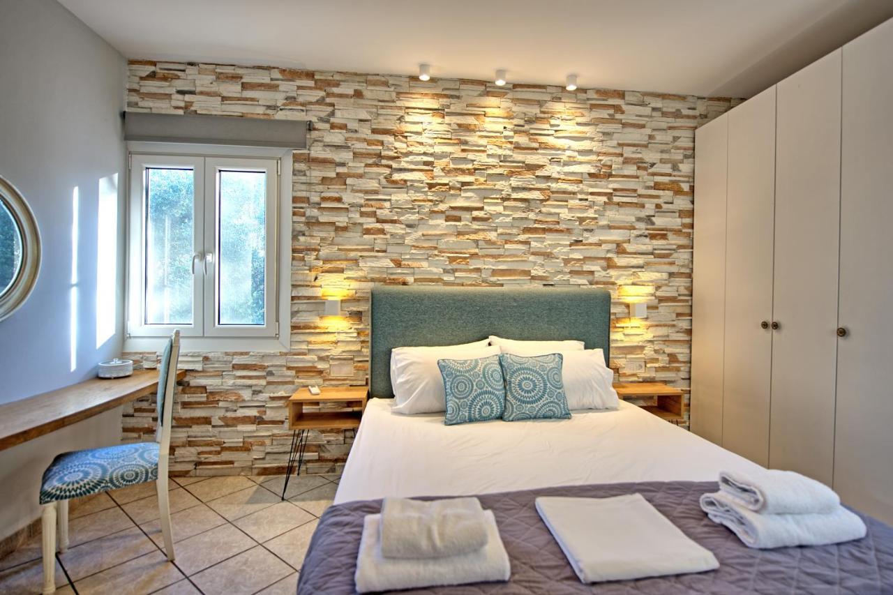 Beachfront Villa Seasun By Posarellivillas Agios Spyridon (Corfu) Exterior foto